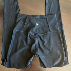 Lululemon black leggings size 4 with mesh on sides